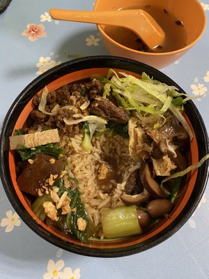 Half eaten Taiwanese braised pork rice 台式卤肉饭 $5, keep finding gems hidden in the bowl of rice at Xiu Yuan Vegetarian Eating House in Central Singapore