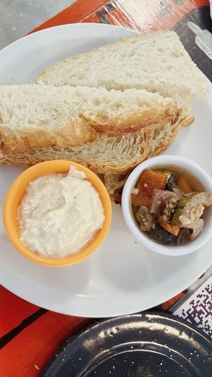 hummus con pan de masa madre  at Casa Munay in Buenos Aires