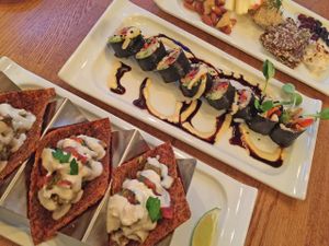 Spiced Corn and Defried Bean Tacos, Jicama Rice Spiced Shittake Sushi Roll , Vegan 'Cheese' Board 



 at Zend Conscious Lounge in Vancouver