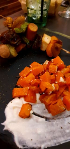 Seitan and sausage skewers with sweet potato and mayo at Cavoli Nostri in Naples