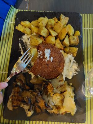 Quinoa Burger after a few bites :) at Cavoli Nostri in Naples