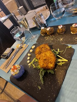 Arancini and aubergine fritter with ‘purple potato surprise'  at Cavoli Nostri in Naples