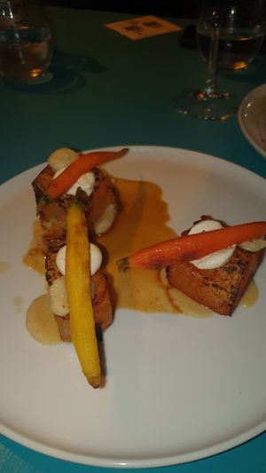 Rubik di patata - Marinated and grilled potato cubes with vegetable jus, caramelized onions, and baby carrots at Cavoli Nostri in Naples