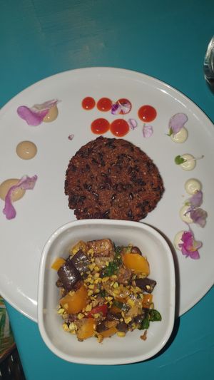 kinoa delle due sicilie -  Quinoa and legume burger with our own style of eggplant caponata  gluten-free version at Cavoli Nostri in Naples