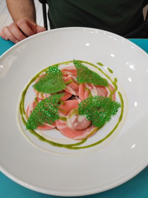 Ravioli stuffed with bolognese, with a ragu, plus basil cream at Cavoli Nostri in Naples