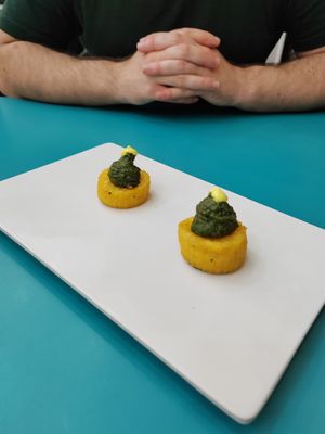 Free whilst we were waiting for our appetisers. Polenta, creamed spinach, lemon at Cavoli Nostri in Naples