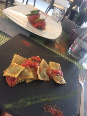 Ravioli stuffed with spinach and aubergine cream and vegetable balls at Cavoli Nostri in Naples