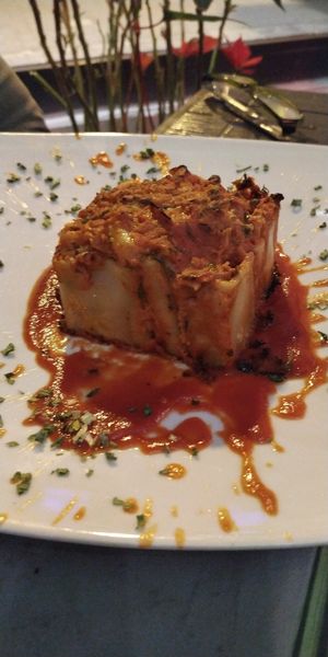 Pasta filled with cauliflower and hot marinara sauce at Cavoli Nostri in Naples