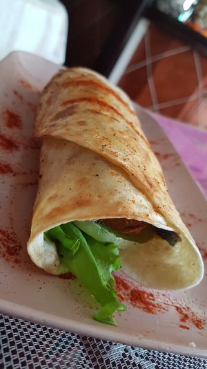 Wrap of hummus, courgette, aubergine, lettuce, sheese and xoriso. Don't recommend as Xoriso  was too salty. at The V Factor in Lanzarote