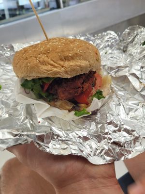 The burger got squashed in my bag but it was SO GOOD at The V Factor in Lanzarote