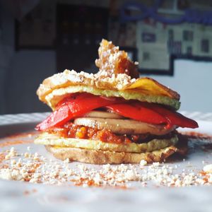 Sweet potato sandwich with vegan "soVrasada", mushroom, rostd pepper and caramelized onion. at The V Factor in Lanzarote