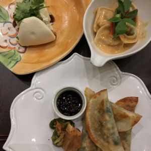 Steams buns with soy chicken, sweet pea ravioli and dumplings at Herban Fix Vegan Kitchen in Atlanta