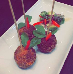 crispy purple yam cake at Herban Fix Vegan Kitchen in Atlanta