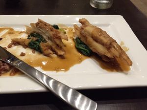Crispy King oyster mushroom glazed w. sesame soy au jus (half eaten!) at Herban Fix Vegan Kitchen in Atlanta