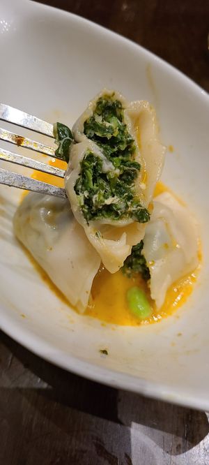 Mushroom and spinach ravioli appetizer at Herban Fix Vegan Kitchen in Atlanta