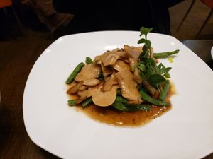 Stir-fry soy chicken in citrus sauce at Herban Fix Vegan Kitchen in Atlanta