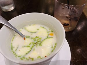 Coconut soup with a lovely mocktail.  at Herban Fix Vegan Kitchen in Atlanta