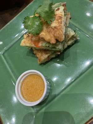 Seared Scallion pancakes with curry sauce at Herban Fix Vegan Kitchen in Atlanta