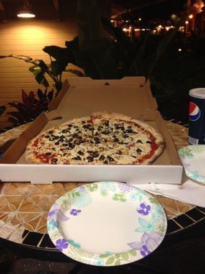 Large vegan cheese pizza with black olives and garlic at Get Sum Pizza in Kailua Kona