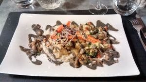 Seasonal vegetable Makloubeh and shiro-miso coco Acquerello risotto, mushrooms, black sesame sauce and sprouted seeds at La Table des Roy in Nantes