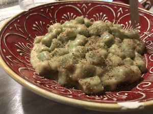 Spinach gnocchi with creamy artichoke sauce at Botanica Lab in Bologna
