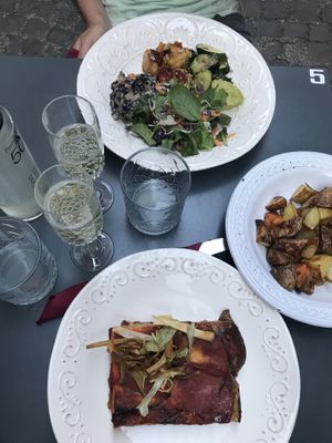 buddha bowl, baked potatoes and parmiggiana at Botanica Lab in Bologna