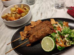 Roasted Potatoes and Jackfruit sticks with great ginger salad and fried yams at Botanica Lab in Bologna