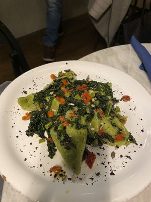 ravioli verdi con ricotta di anacardi, cavolo nero e pomodori secchi at Botanica Lab in Bologna