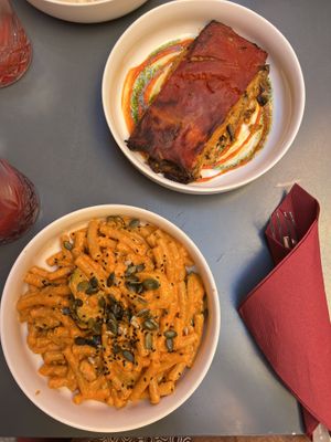 Parmigiana and pasta  at Botanica Lab in Bologna