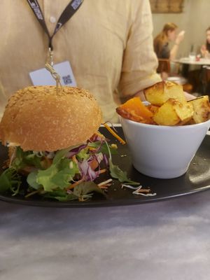 Beyond Burger...there is a burger under that lettuce I promise! My partner started taking the tomatoes out! at Botanica Lab in Bologna