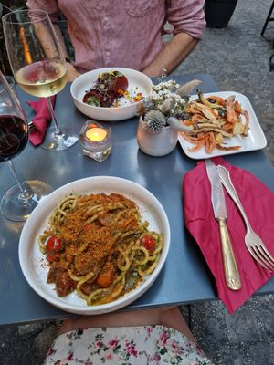Tomato roll, pasta and fried veggies as a side at Botanica Lab in Bologna