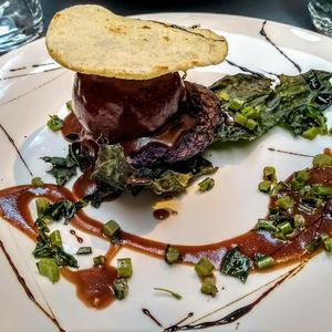 Beetroot with barbecue sauce on bean and quinoa cream with a quinoa crisp at Botanica Lab in Bologna