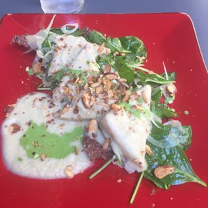 Tempeh with jerusalem artichoke cream and nuts at Botanica Lab in Bologna