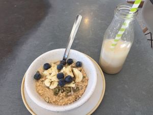 Porridge (minus the nuts) and a morning glory smoothie, which was delicious! at Rawberry in Winchester