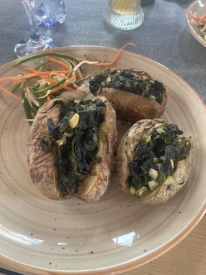 Jacket potatoes with spinach  at Hotel Sighisoara in Sighisoara