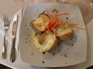 Jacket potato with cheese  at Hotel Sighisoara in Sighisoara