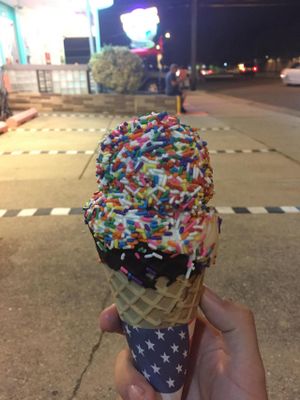 Cool Scoops vegan vanilla ice cream on a vegan chocolate dipped cone, with rainbow sprinkles. Awesome :-) at Cool Scoops in North Wildwood