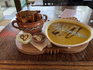 Pumpkin soup and (Fantastic) Homemade Fries   at Public Bar & Vegan Kitchen in Bled