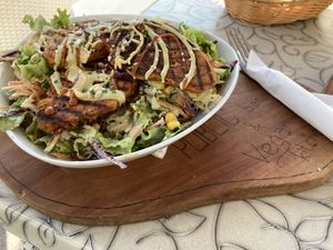 Chickpea fritters on a salad bed  at Public Bar & Vegan Kitchen in Bled