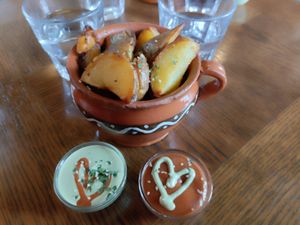 Potatoes with sauce at Public Bar & Vegan Kitchen in Bled