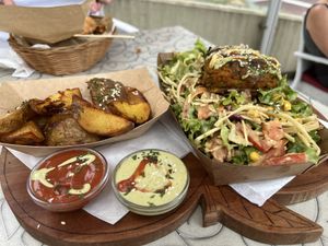 Burger on house salad   at Public Bar & Vegan Kitchen in Bled