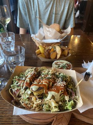 Chickpea fritters, chips (burger in the background)  at Public Bar & Vegan Kitchen in Bled