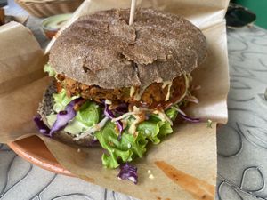 House burger with buckwheat bun  at Public Bar & Vegan Kitchen in Bled