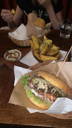 Burgers and potato wedges  at Public Bar & Vegan Kitchen in Bled