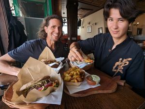 Happy vegans at Public Bar & Vegan Kitchen in Bled