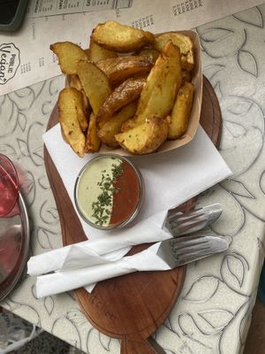 Potato wedges, vegan mayo & ketchup   at Public Bar & Vegan Kitchen in Bled