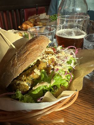 Club burger w/ buckwheat bun  at Public Bar & Vegan Kitchen in Bled