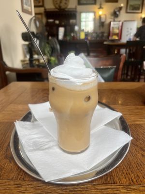iced coffee with vegan cream & oat milk  at Public Bar & Vegan Kitchen in Bled