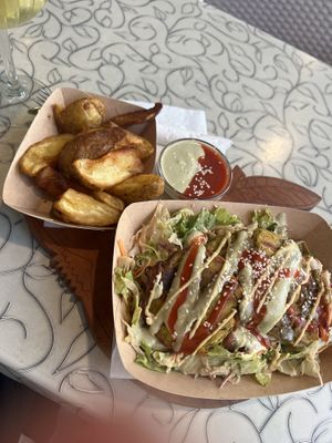 Wedges and corn fritters with dip  at Public Bar & Vegan Kitchen in Bled