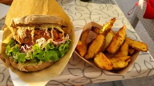 Bean Burger with wedgea at Public Bar & Vegan Kitchen in Bled